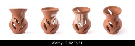 collection of empty clay flower vase or pots isolated on white background, earthenware with carved or engraved design, in different angles, closeup Stock Photo
