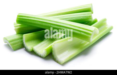 Pile of celery ribs isolated on white background. Stock Photo