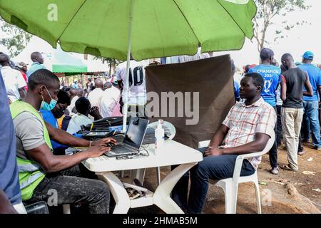 Nairobi, Kenya. 06th Feb, 2022. A man seen being registered by an IEBC agent, during the last day of mass voters registration in Kibera Slums. Due to lack of ID cards to mostly the young youths and new voters who were not able to register, the Independent Electoral and Boundaries Commission of Kenya (IEBC) on its second National enhanced Continuous Voter Registration (ECVR) has registered a total of 1, 031,645 voters during the enhanced continuous listing exercise that ended on 16th Feb 2022. Credit: SOPA Images Limited/Alamy Live News Stock Photo