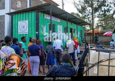 Nairobi, Kenya. 06th Feb, 2022. Voter are seen in queue waiting to be registered during the last day of mass voters registration in Kibera Slums. Due to lack of ID cards to mostly the young youths and new voters who were not able to register, the Independent Electoral and Boundaries Commission of Kenya (IEBC) on its second National enhanced Continuous Voter Registration (ECVR) has registered a total of 1, 031,645 voters during the enhanced continuous listing exercise that ended on 16th Feb 2022. Credit: SOPA Images Limited/Alamy Live News Stock Photo