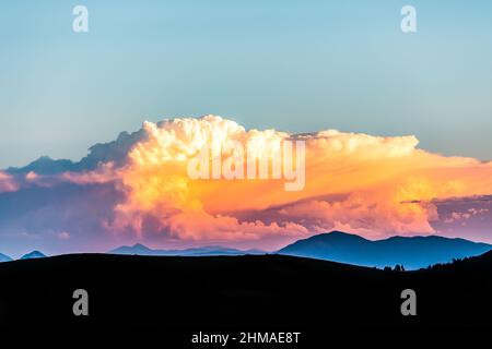 Billowing Clouds Glowing at Sunset Stock Photo