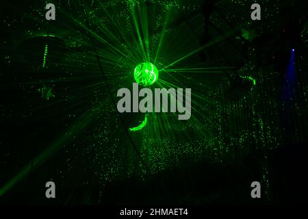 circus laser show performance in complete darkness Stock Photo