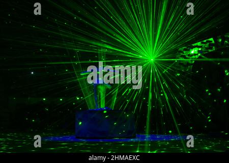 circus laser show performance in complete darkness Stock Photo