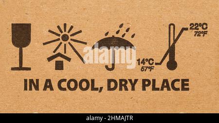 Cool Dry Place Cardboard Warning Symbol Background. Stock Photo