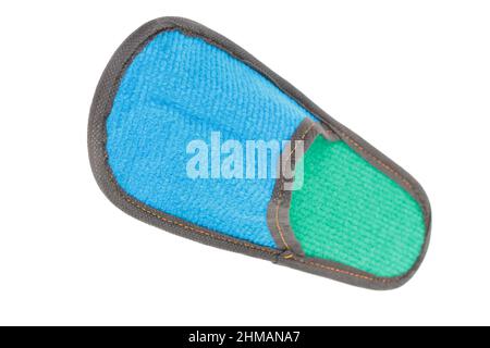 Slippers made of felt have a blue-green color. Isolated over white background. Close-up. Stock Photo