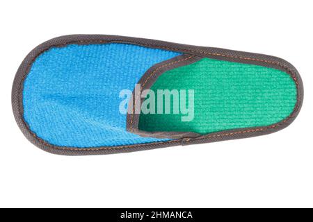 Slippers made of felt have a blue-green color. Isolated over white background. Close-up. Stock Photo