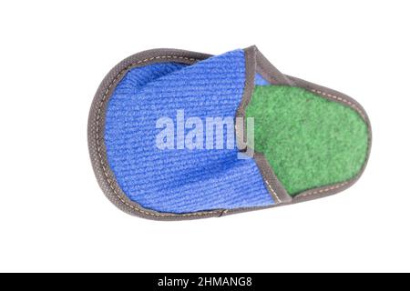 Slippers made of felt have a blue-green color. Isolated over white background. Close-up. Stock Photo