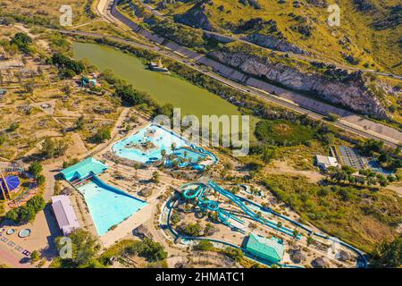 Vista aerea del humedal de La Sauceda y parque de diceversiones y atracciones abandonado, Aerial view of the La Sauceda wetland and abandoned entertainment and amusement park Sauceda y cerro de la antigua cementera, during World Wetlands Day to promote the care and conservation of the biodiversity of ecosystems on February 5, 2022 in Hermosillo, Mexico. (Photo by Luis Gutierrez Norte Photo/) Stock Photo