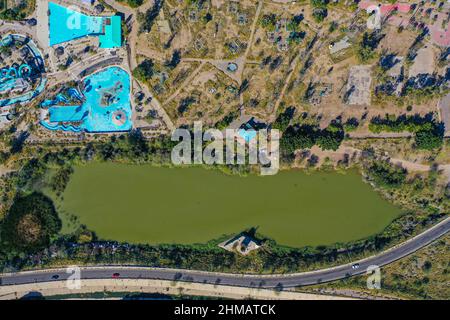 Vista aerea del humedal de La Sauceda y parque de diceversiones y atracciones abandonado, Aerial view of the La Sauceda wetland and abandoned entertainment and amusement park Sauceda y cerro de la antigua cementera, during World Wetlands Day to promote the care and conservation of the biodiversity of ecosystems on February 5, 2022 in Hermosillo, Mexico. (Photo by Luis Gutierrez Norte Photo/) Stock Photo