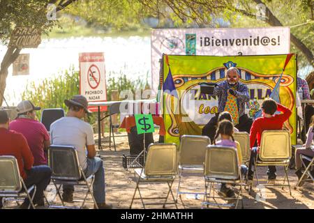 Members of the theater play Odisea Rodante de Zancadilla Treatro interact with children and adults next to the Sauceda Park wetland,Integrantes de la obra de teatro Odisea Rodante de Zancadilla Treatro interactúa con niños y adultos junto al humedal del Parque Sauceda, during World Wetlands Day to promote the care and conservation of the biodiversity of ecosystems on February 5, 2022 in Hermosillo, Mexico. (Photo by Luis Gutierrez Norte Photo/) Stock Photo