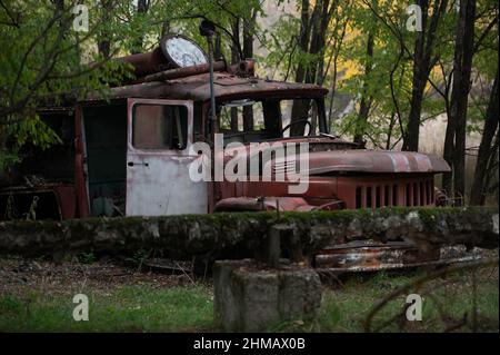 An abandoned fire truck in Pripyat, Ukraine near the Chernobyl Nuclear Power Plant. Stock Photo