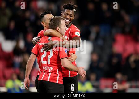 EINDHOVEN, NETHERLANDS - FEBRUARY 8: Mario Gotze of PSV celebrates with Eran Zahavi of PSV and Ibrahim Sangare of PSV after scoring his sides second goal during the Dutch TOTO KNVB Cup match between PSV and NAC Breda at the Philips Stadion on February 8, 2022 in Eindhoven, Netherlands (Photo by Broer van den Boom/Orange Pictures) Stock Photo