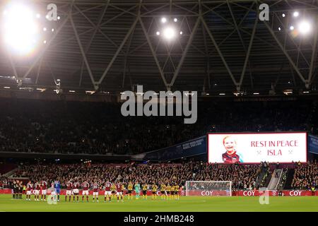 London, UK. 08th Feb, 2022. Watford and West Ham players and fans observe a minute's applause in tribute to Isla Caton.Premier League match, West Ham Utd v Watford at the London Stadium, Queen Elizabeth Olympic Park in London on Tuesday 8th February 2022. this image may only be used for Editorial purposes. Editorial use only, license required for commercial use. No use in betting, games or a single club/league/player publications. pic by Steffan Bowen/Andrew Orchard sports photography/Alamy Live news Credit: Andrew Orchard sports photography/Alamy Live News Stock Photo