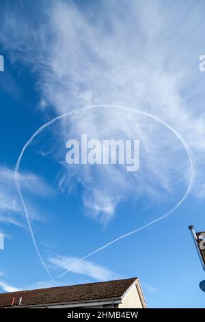 A aeroplanes vapour trail in a full circle Stock Photo