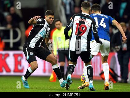 Newcastle United's Bruno Guimaraes (left) in action during the Premier League match at St James' Park, Newcastle. Picture date: Tuesday February 8, 2022. Stock Photo