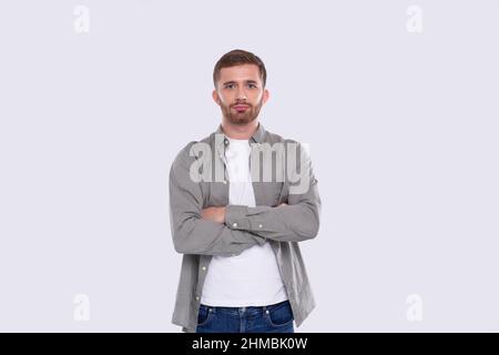 Man Hands Crossed Standing Isolated Serious Face. Man Posing Stock Photo