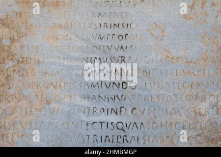 Ancient Greek inscriptions on stone in Ephesus archeological site in Turkey - writings, design, background, texture, creative use Stock Photo