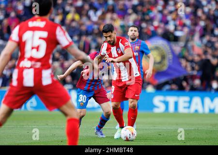BARCELONA - FEB 6: Luis Suarez in action during the La Liga match between FC Barcelona and Club Atletico de Madrid at the Camp Nou Stadium on February Stock Photo