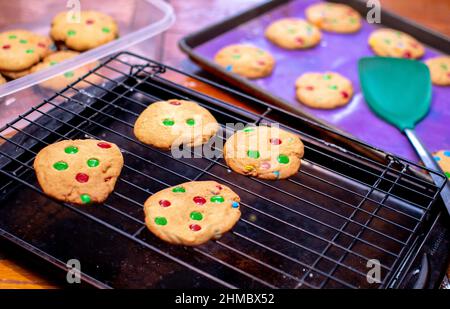 Extra large candy cookies are made with candy dots, and the first cookie to be grabbed by tiny hands Stock Photo