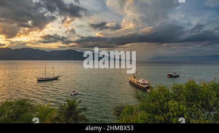 Sunset at the harbour in Ilhabela, Sao Paulo, Braizil. Stock Photo