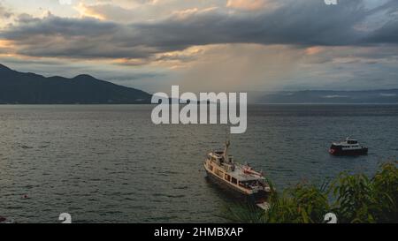 Sunset at the harbour in Ilhabela, Sao Paulo, Braizil. Stock Photo