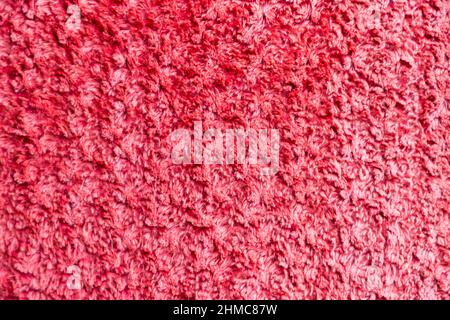 Red synthetic fabrics background Stock Photo