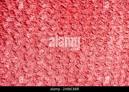 Red synthetic fabrics background Stock Photo