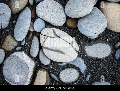 Rocks on a beach. Cracks dry slow. Ruby Beach, Washington Coast, USA. Stock Photo