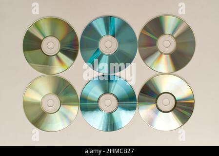 CD and DVD disk on white background. Technology from the 90s Stock Photo