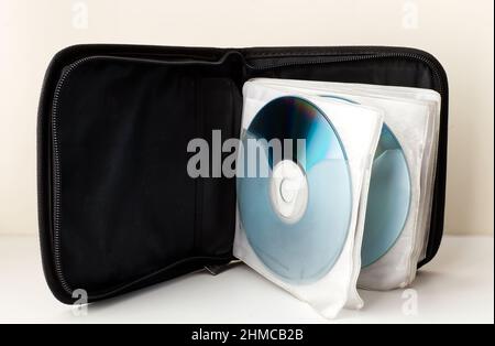 Black Case for CD and DVD on white background. Technology from the 90s. Stock Photo