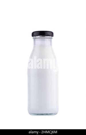front view closeup of half liter glass bottle of fresh milk mockup with black colored cap enclosure and no label  isolated on white background Stock Photo