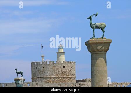 Mandraki harbour and fortress Agios Nicolaos,Rhodos city, Rhodos island, Greece Stock Photo