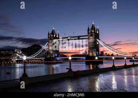 London, UK. 9th Feb, 2022. UK Weather: Sunrise over Tower Bridge and City Hall. Beautiful colours at first light as London wakes up to another day fine and mild day. Credit: Celia McMahon/Alamy Live News Stock Photo