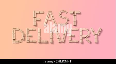 Fast delivery from cardboard boxes on a pink background. Stock Photo