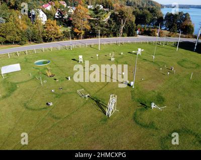 A meteorological garden with many devices for measuring weather phenomena. Equipment on meteorological station to monitor weather events Stock Photo