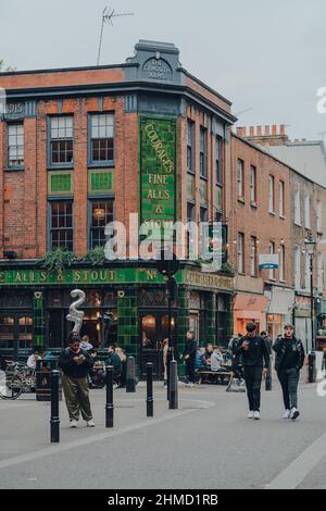 London, UK - October 23, 2021: People walk on Exmouth Market, a semi-pedestrianised street in Clerkenwell, Islington, and a famous street market. Stock Photo