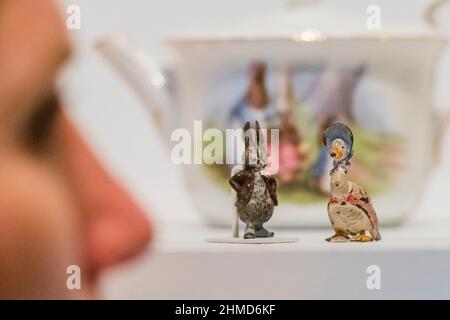 London, UK. 9th Feb, 2022. Miniature figurines of Benjamin Bunny and Jemima Puddle-duck by Franz Bergmann, property of the National trust - Beatrix Potter: Drawn to Nature (in partnership with the National Trust) at the V&A. It runs from 12 February 2022 - 8 January 2023. Credit: Guy Bell/Alamy Live News Stock Photo