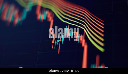 Concept of stock market and fintech. Blurry digital charts over dark blue background. Stock Photo