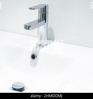 https://l450v.alamy.com/450v/2hmddmj/mixer-cold-hot-water-modern-faucet-bathroom-kitchen-tap-isolated-white-background-chrome-plated-metal-2hmddmj.jpg