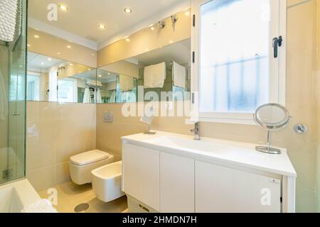 a image of a brand new modern style bathroom in a apartment Stock Photo