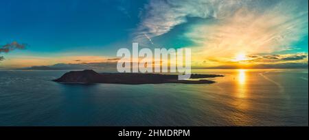 dramatic sunrise over Lobos island and Flag Beach near Corralejo Fuerteventura Stock Photo