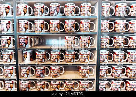 Memphis, Tennessee - January 13, 2022: Coffee mugs souviners for sale, with names, celebrating Graceland and Elvis Presley Stock Photo