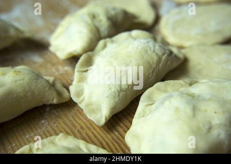 Delicious homemade Polish dumplings ready for cooking, close up Stock Photo