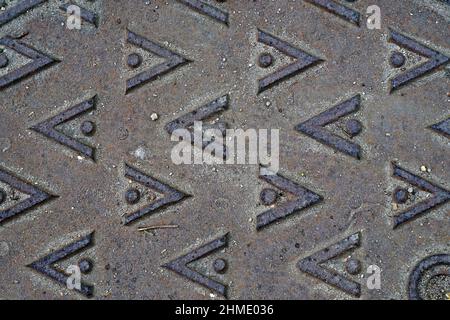 Metallic surface with arrows and dots Stock Photo