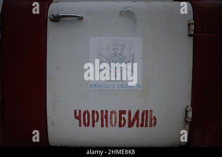 A fire truck from the Chernobyl Nuclear Power Plant sits at a vehicle 'graveyard' in the city of Pripyat, Ukraine. Stock Photo