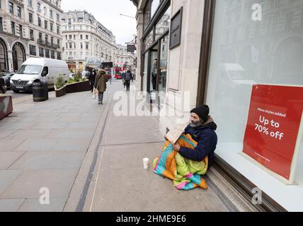 Poverty London UK; a man begging on the street for money, Regent Street, central London UK Stock Photo