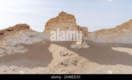 Zekreet desert natural landscape with with many limestone rocks.formed into different shapes due to wind erosion. Stock Photo