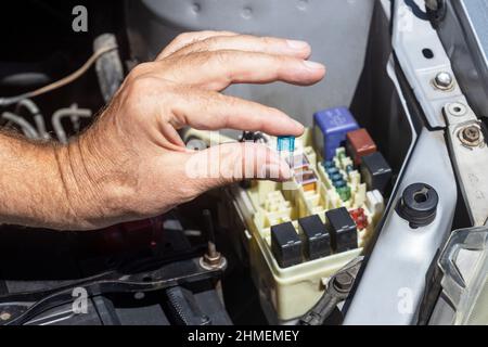 A car fuse replacement close up Stock Photo