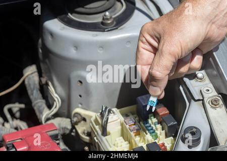 A car fuse replacement close up Stock Photo