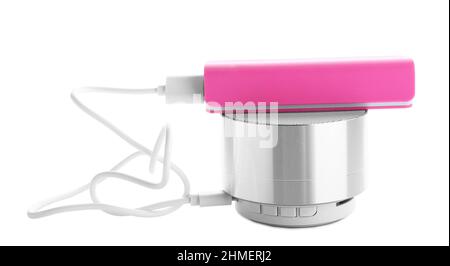 Pink power bank with speaker on white background Stock Photo